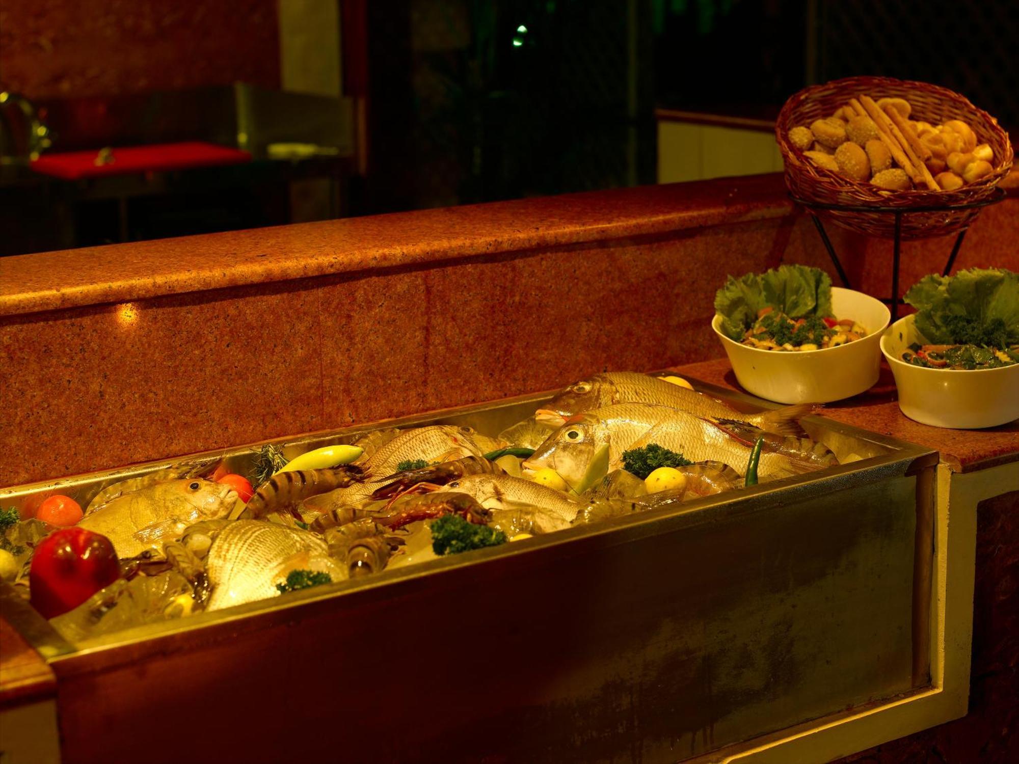 Vivanta Ernakulam, Marine Drive Kochi Restaurante foto